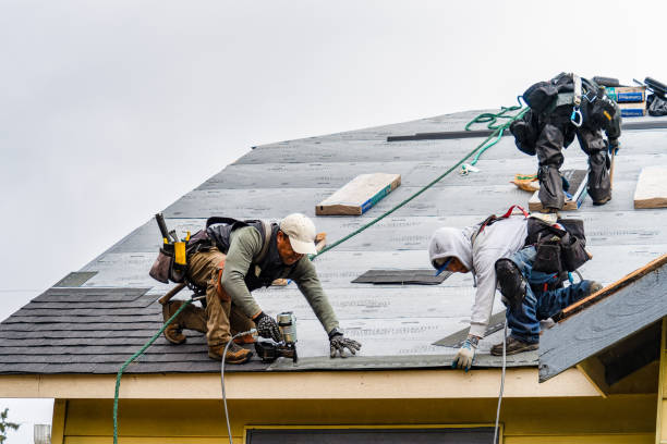 Professional Gutter Installation technician working in Gambier, OH